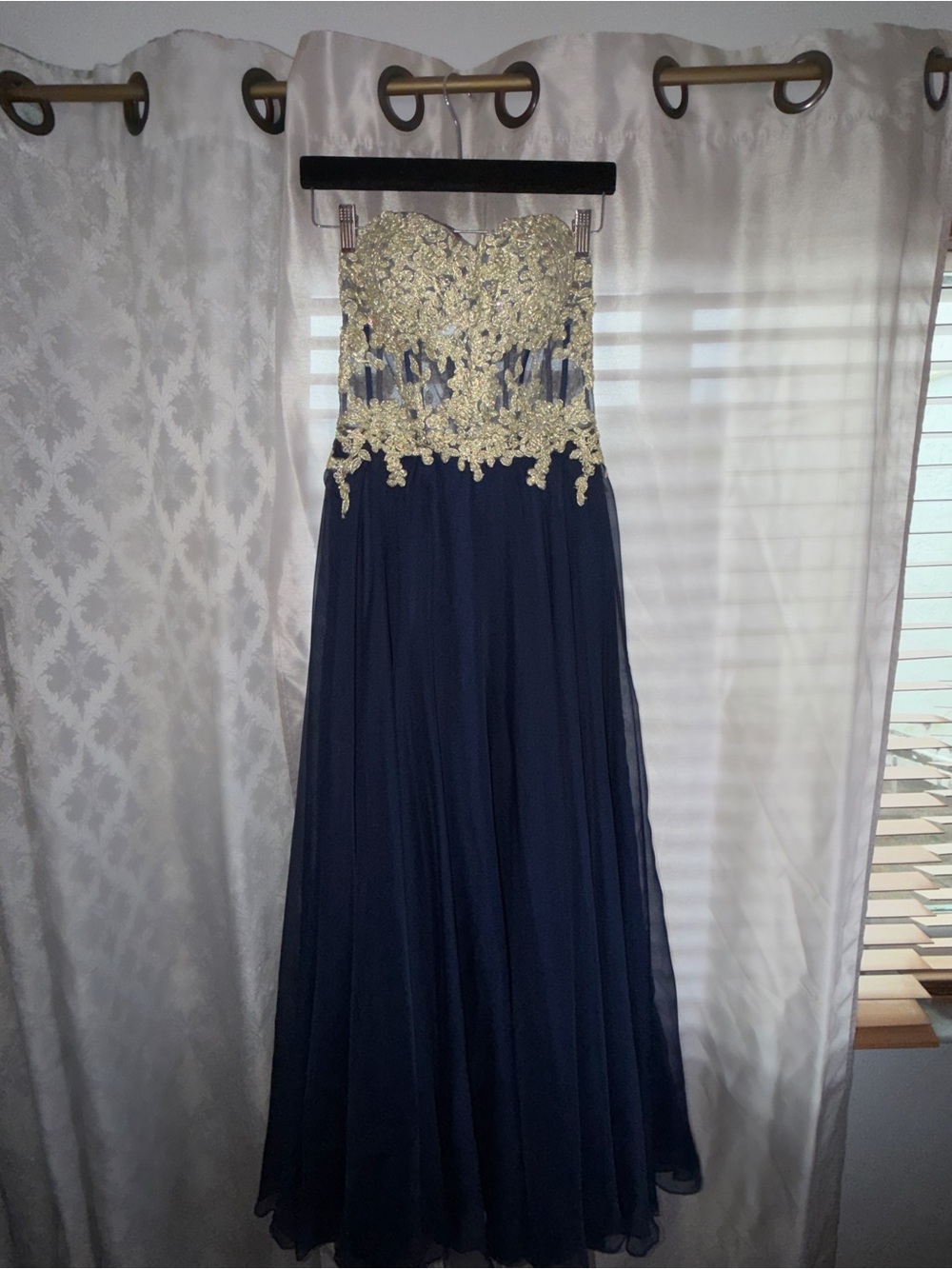 Women’s navy and gold gown